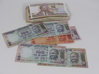 Lot 353 - A collection of world bank notes to include,...