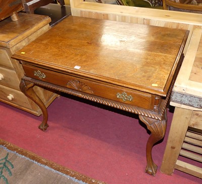 Lot 1235 - An early 20th century oak single drawer side...