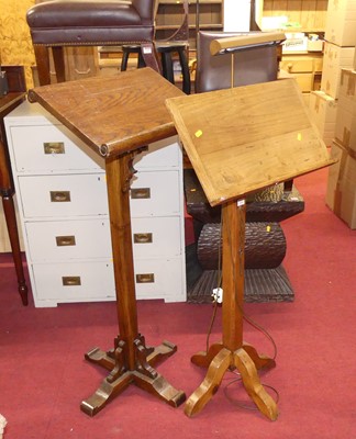 Lot 1243 - An oak freestanding lectern, together with a...