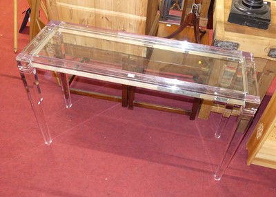 Lot 1244 - A contemporary perspex and bevelled glass...