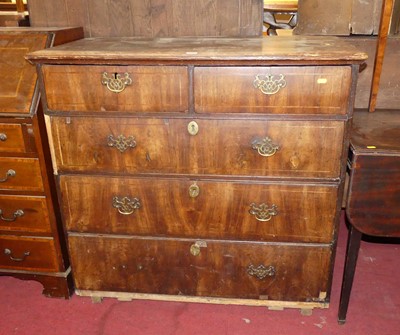 Lot 1250 - A mid-18th century figured walnut square front...