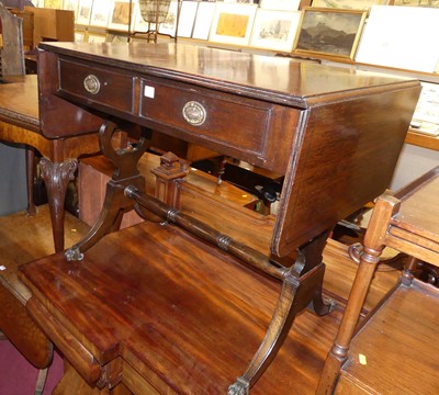 Lot 1256 - A mahogany sofa table, in the Regency taste,...