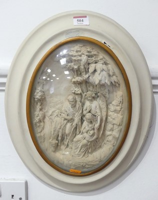 Lot 504 - A wooden framed oval plaster of paris carved...