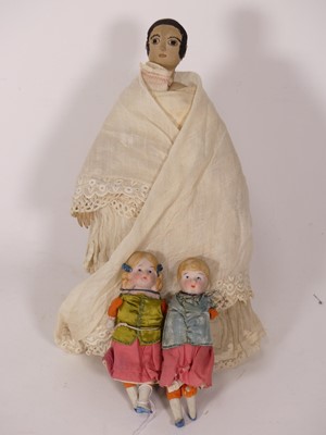 Lot 440 - A mid-20th century stitched fabric doll,...