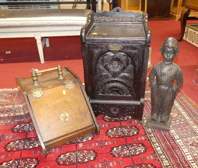 Lot 1269 - A relief carved early 20th century oak coal...