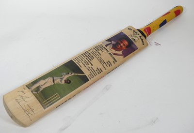 Lot 444 - A signed cricket bat, displaying the career...