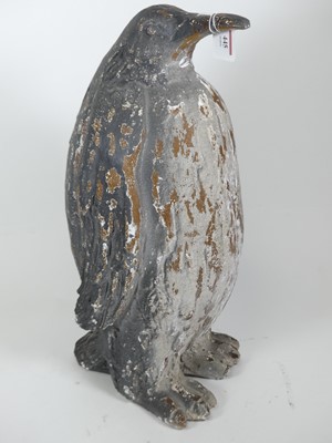 Lot 445 - A painted composite figure of a penguin,...