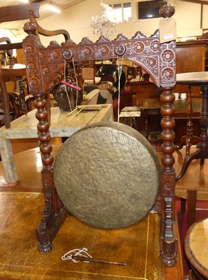 Lot 1284 - A circa 1900 relief carved oak freestanding...