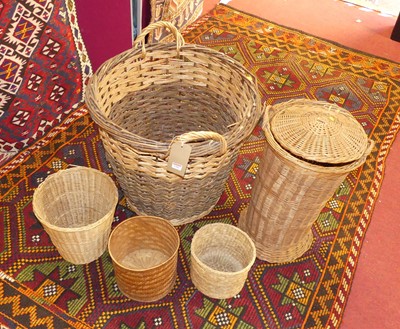 Lot 1285 - A twin handled wicker log basket, together...
