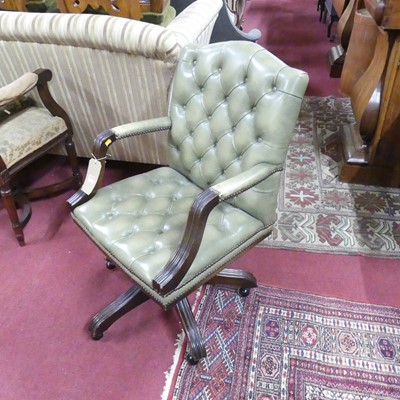 Lot 1289 - A contemporary mahogany and sage green leather...