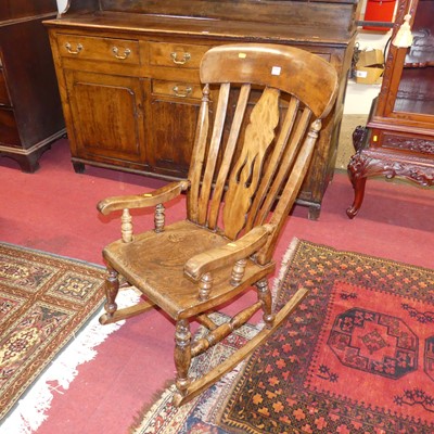 Lot 1293 - An elm, beech and fruitwood splatback...