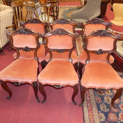 Lot 1299 - A set of six mid-Victorian floral carved...