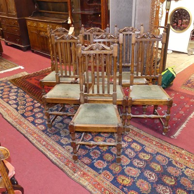 Lot 1307 - A set of eight early 20th century walnut...