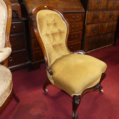 Lot 1318 - A mid-Victorian floral carved and walnut...