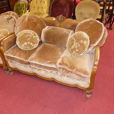 Lot 1321 - A 1920s figured walnut framed and cane inset...