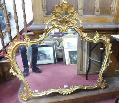 Lot 1323 - A pierced floral gilt decorated shaped wall...