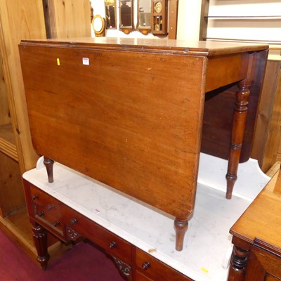 Lot 1335 - A Victorian mahogany round cornered drop-leaf...