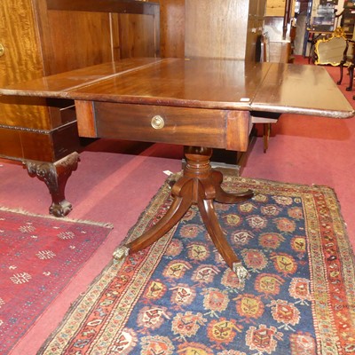Lot 1342 - A William IV mahogany pedestal drop-flap...
