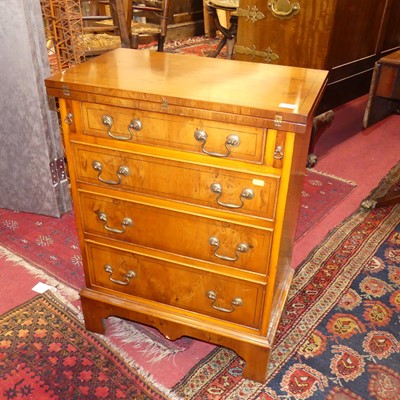 Lot 1344 - A contemporary yew bachelor's chest of four...