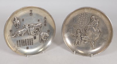 Lot 392 - A pair of reproduction Chinese metal dishes,...