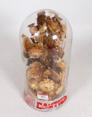 Lot 402 - A dried flower diorama, housed under glass...