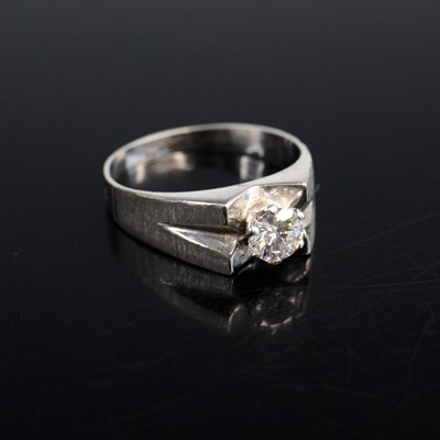 Lot 2057 - A white metal diamond solitaire ring featuring...