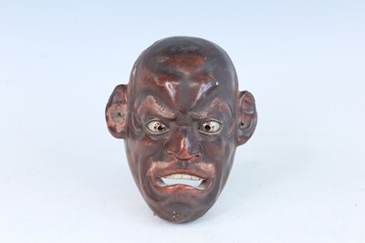 Lot 4 - A Japanese lacquer mask, Meiji period Modelled...