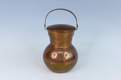Lot 23 - An antique copper Guernsey-style jug with...