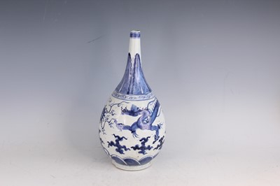 Lot 43 - A Chinese blue and white pear-shaped vase,...