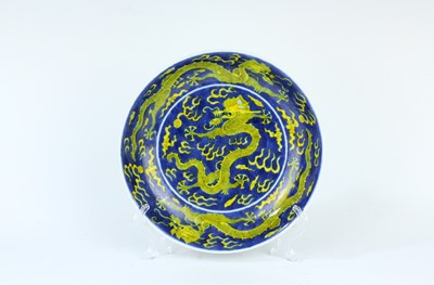 Lot 92 - A yellow-enamelled and blue-ground ‘dragon’...