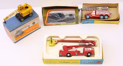 Lot 699 - Four Corgi and Dinky Toys to include a Corgi...