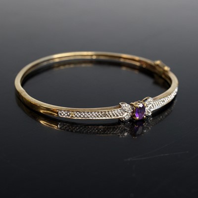 Lot 2024 - A yellow and white metal hollow hinged oval...