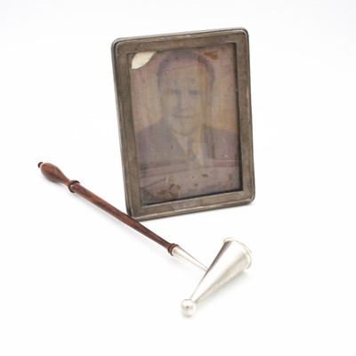 Lot 248 - A George V silver-clad photograph frame, of...