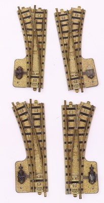 Lot 391 - Four pre-war Hornby-Dublo clockwork points,...