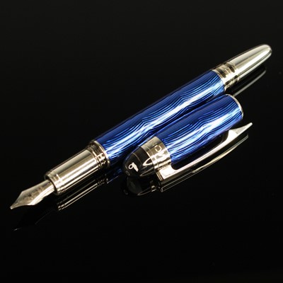Lot 299 - A blue guilloche lacquer fountain pen with...