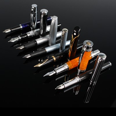 Lot 413 - A collection of five Sheaffer fountain pens,...