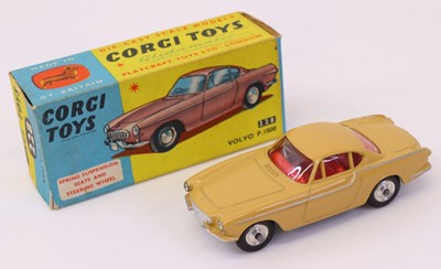 Lot 532 - Corgi Toys No 228 Volvo P1800 comprising a tan...