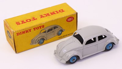 Lot 610 - Dinky Toys No.181 VW saloon comprising a grey...