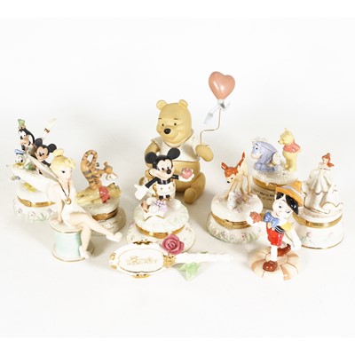 Lot 154 - A collection of Lenox Disney figures and...