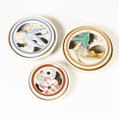Lot 201 - A group of three Clarice Cliff ashtrays, each...