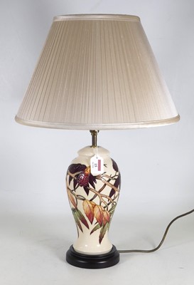 Lot 15 - A Moorcroft pottery 'Sumac Tree' pattern table...