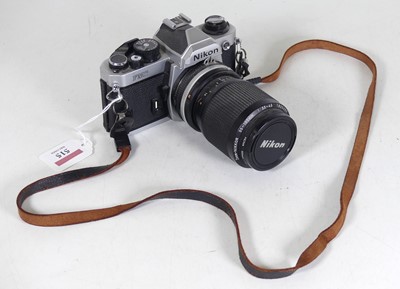 Lot 515 - A Nikon FM2 SLR camera body, serial number N...