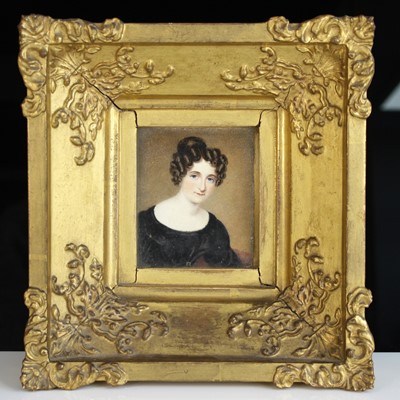 Lot 501 - A late 19th century miniature head and...