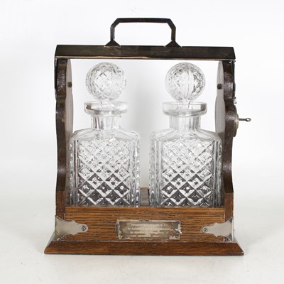 Lot 36 - A Victorian style oak and silver plated metal...