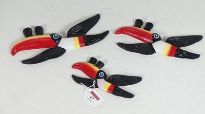 Lot 47 - A graduated set of three reproduction painted...
