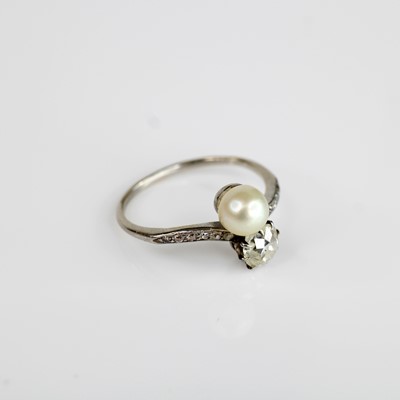 Lot 2027 - A white metal, pearl and diamond 'Toi et Moi'...
