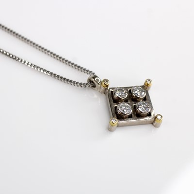 Lot 2030 - An 18ct white gold diamond geometric style...