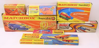 Lot 829 - A collection of Matchbox Superfast race sets,...
