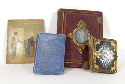 Lot 74 - A Victorian visiting card album, bound in...
