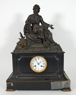 Lot 77 - A late 19th century black slate cased mantel...